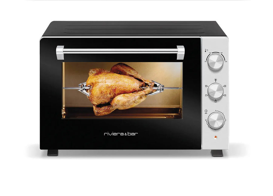 Four électrique avec poulet rôti.