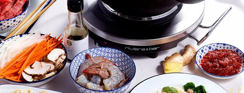 Réchaud électrique riviera&bar avec casserole chauffée posée dessus