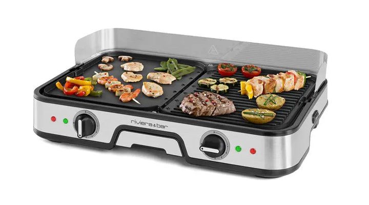 Le plancha-gril Combiné de riviera&bar est doté de plaques de gril réversibles en aluminium, plates et striées, pour une cuisson précise des légumes, du poulet, des crevettes, des steaks et des pommes de terre. Conception en acier inoxydable avec boutons de commande frontaux et voyants lumineux.