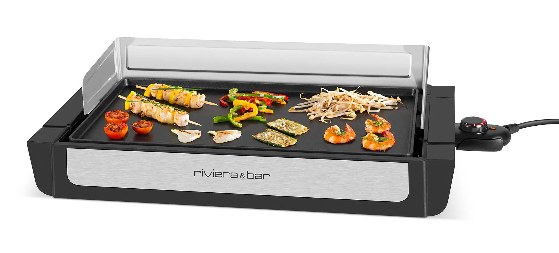 Grill électrique Riviera & Bar avec aliments grillés.

