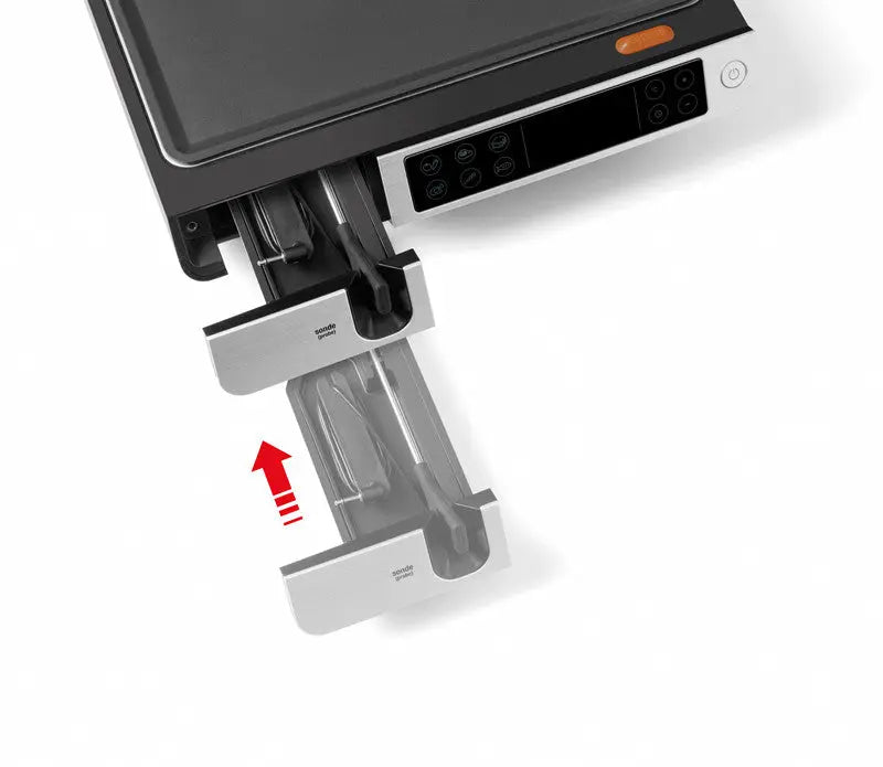 Grill électrique avec tiroir à ustensiles.