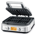 Gaufrier en acier inoxydable ouvert.