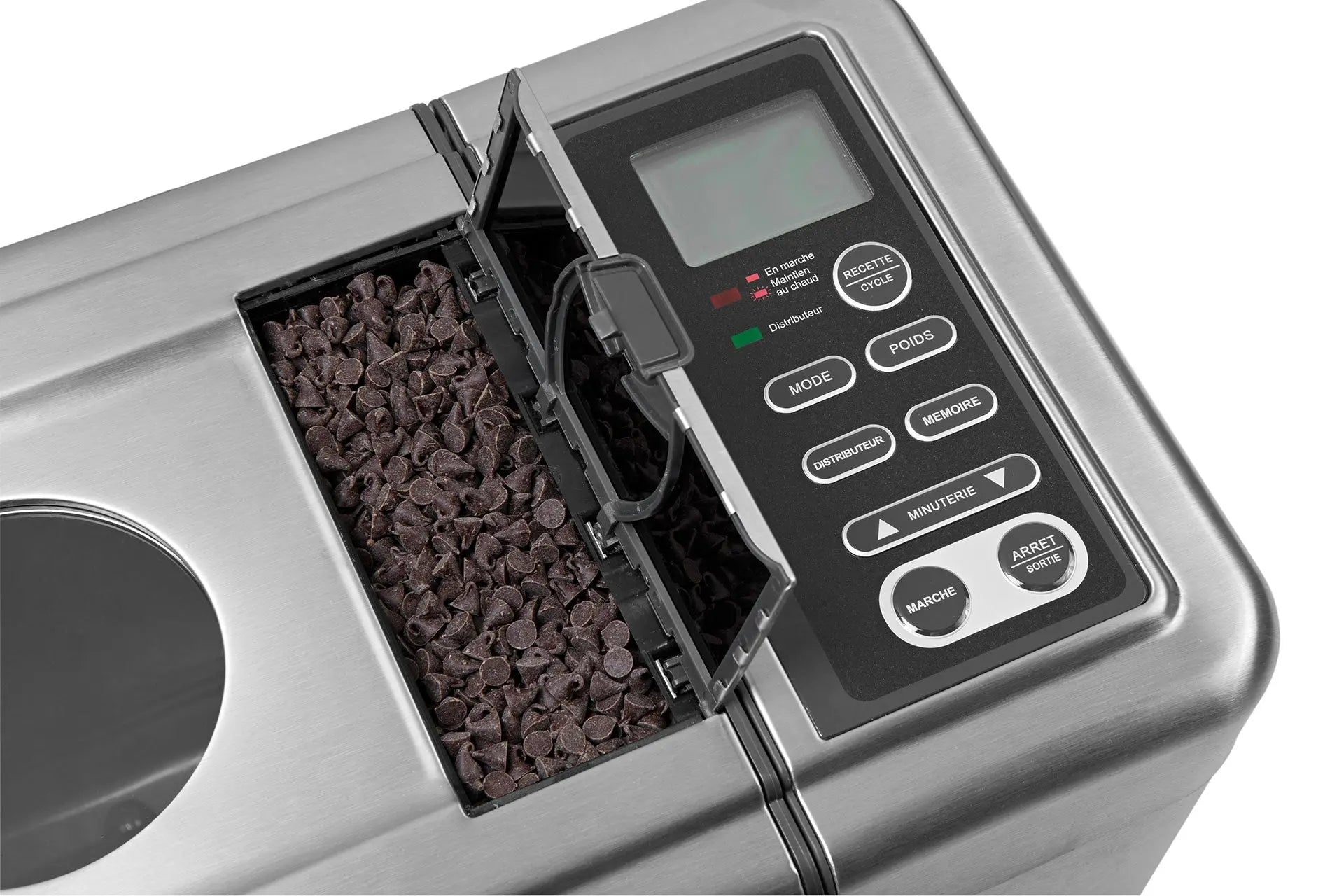 Machine à pain en acier inoxydable avec distributeur de pépites de chocolat ouvert.