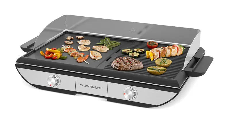 Grill électrique Riviera & Bar avec divers aliments en cuisson.