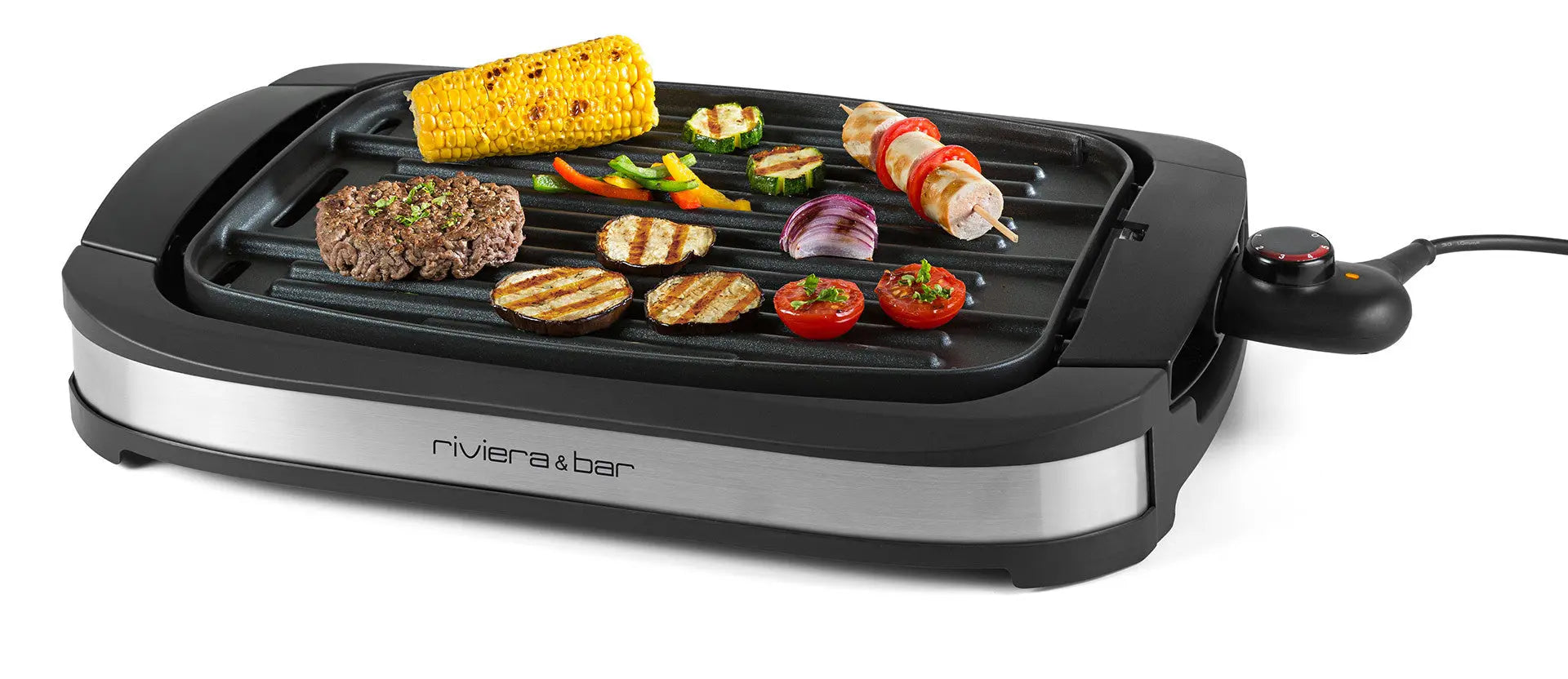 Barbecue électrique avec légumes et viande grillés.
