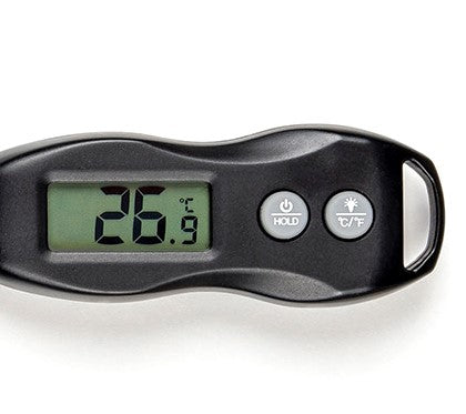 Un thermomètre numérique affiche une température de 26,9°C. L'appareil comporte trois boutons intitulés HOLD, power et °C/°F, un boîtier en plastique noir et un écran LCD.