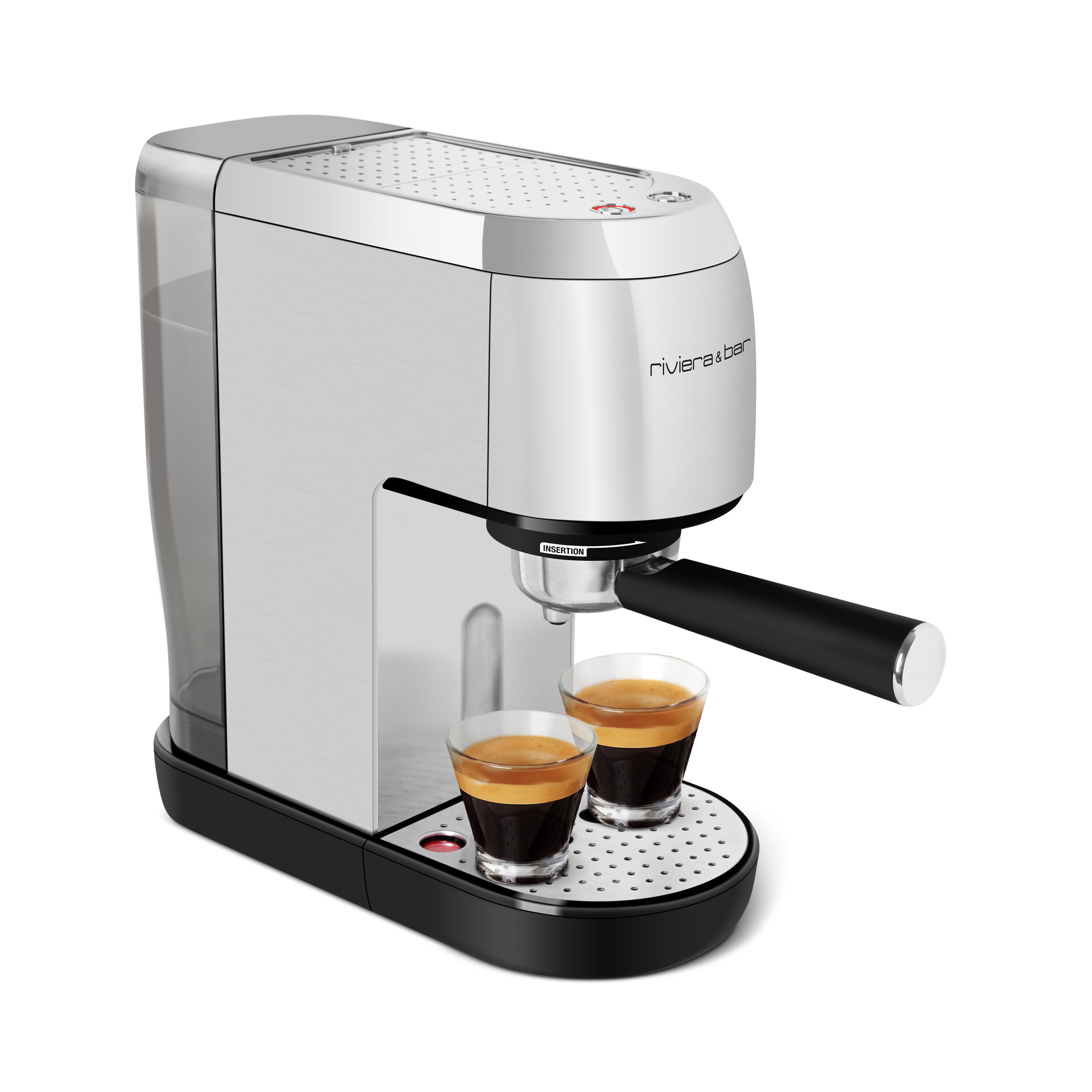 La riviera&bar Expresso Compact Manuel est une machine à espresso moderne de couleur argentée avec une poignée noire, un réservoir d'eau transparent et une pompe à 19 bars. Elle prépare deux tasses simultanément en utilisant du café moulu pour une saveur riche et authentique dans des tasses transparentes.
