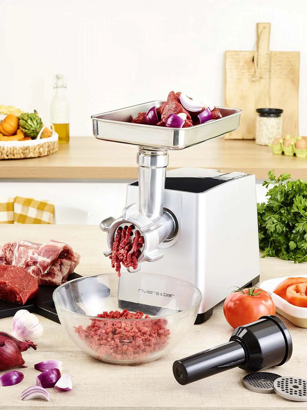 Hachoir à viande électrique en acier inoxydable.
