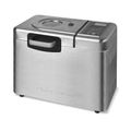 La riviera&bar Machine à pain inox Sans gluten & Co - QMP 660 est une machine à pain en acier inoxydable avec un panneau de contrôle digital et une fenêtre de visualisation, idéale pour faire du pain sans gluten. Le nom de la marque est embossé sur la face avant.
