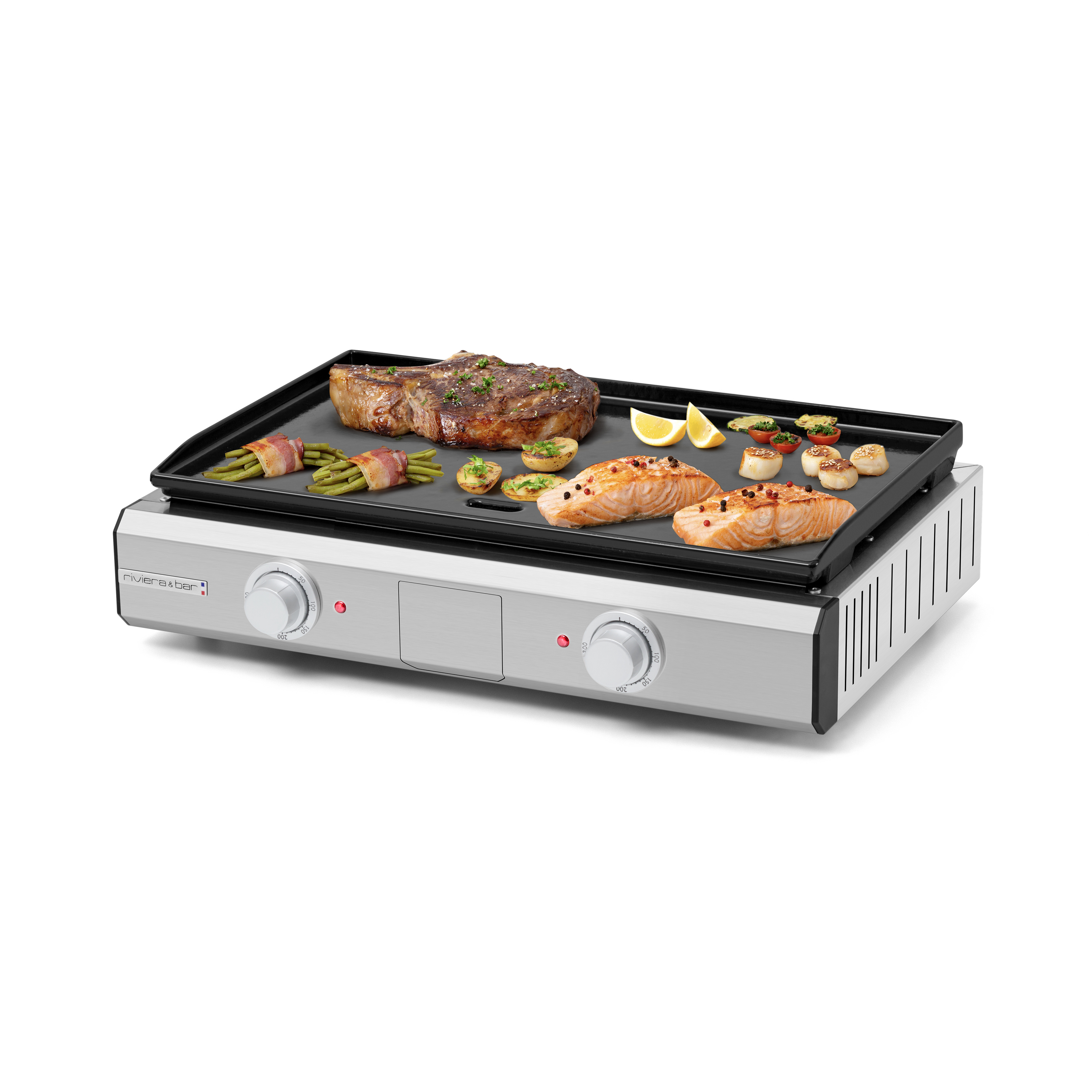 La Plancha intérieure extérieure riviera&bar, avec ses deux boutons de commande et sa plaque de gril en fonte émaillée, permet de cuire steaks, saumons, crevettes, légumes et quartiers de citron sur sa surface de gril noire pour une cuisson homogène.
