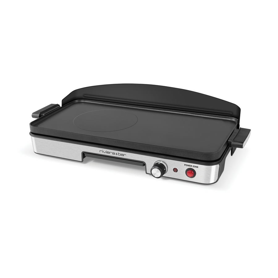 La Plancha Power zone de riviera&bar est une plancha électrique en acier inoxydable avec une surface antiadhésive noire, une protection arrière surélevée, un bouton de température à l'avant et un voyant de puissance rouge - idéal pour les repas intimes pour 2 personnes.