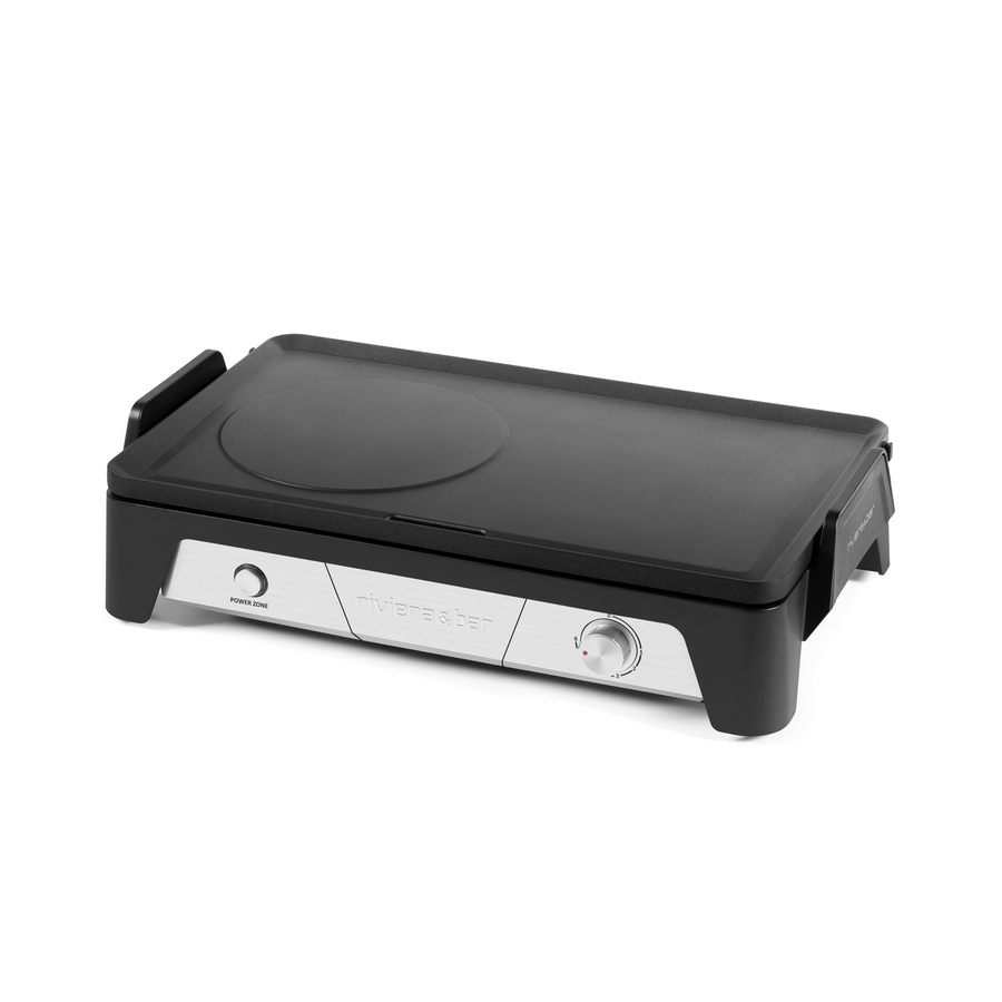 La Plancha-Gril QPL450 de riviera&bar offre une surface de cuisson plate et antiadhésive sans PFAS, un réglage précis de la température, et une façade argentée avec des accents noirs pour une cuisson saine au quotidien.