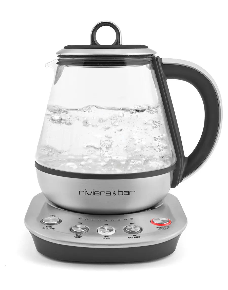 Bouilloire électrique en verre et acier inoxydable.