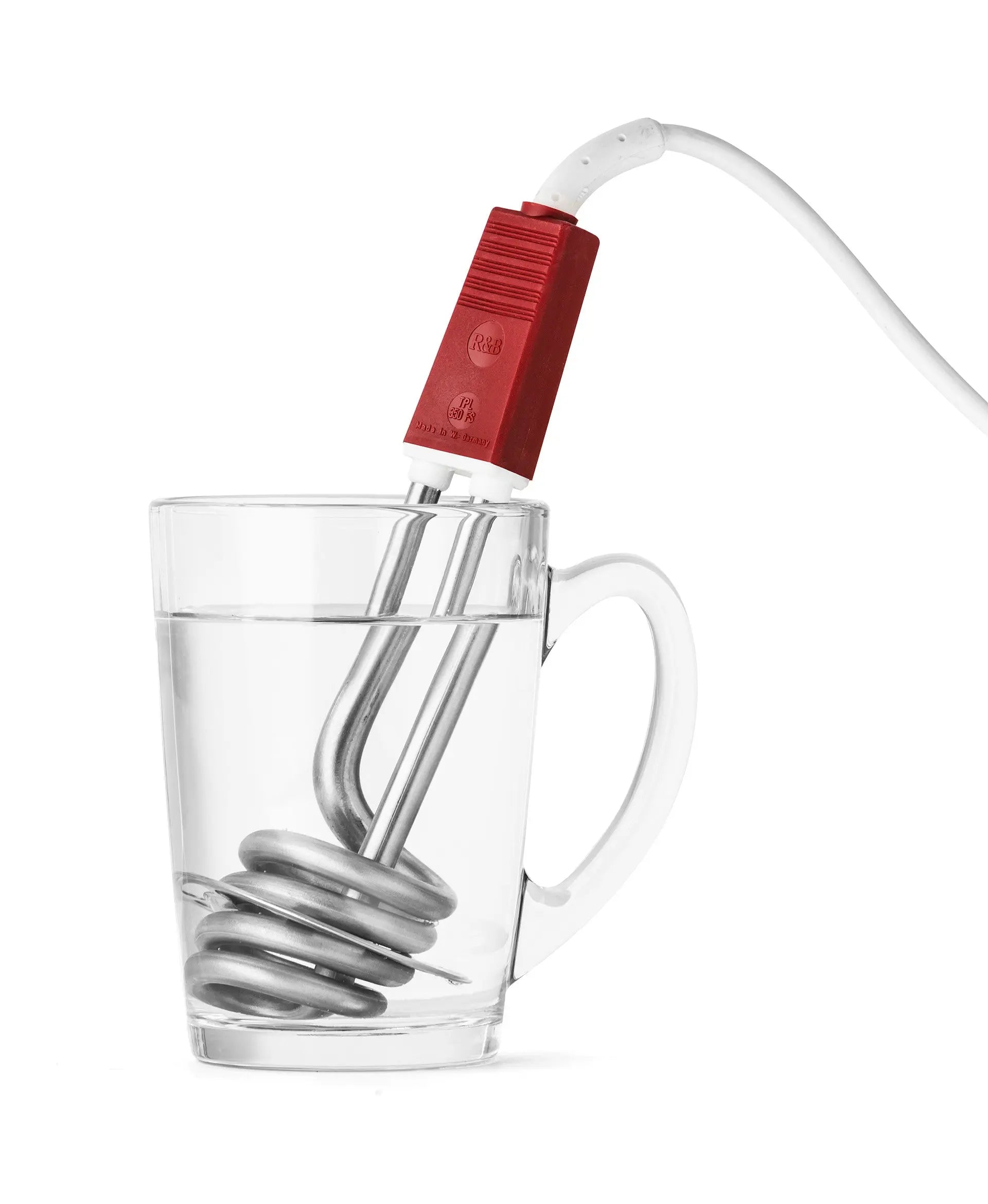 Thermobloc de voyage dans un verre d'eau.