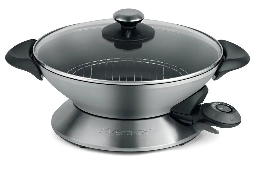 Wok électrique en inox avec couvercle en verre.