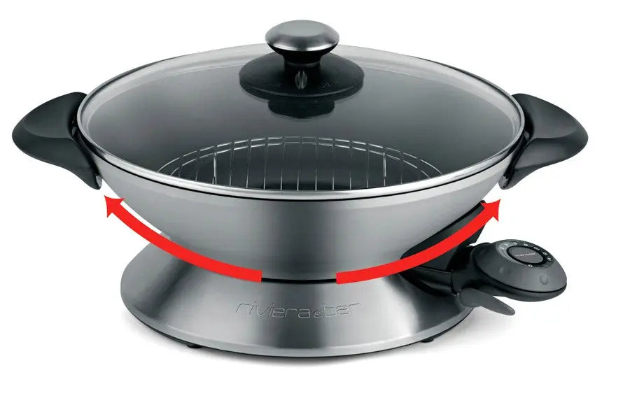 Wok électrique en inox avec couvercle en verre.
